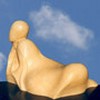 sculpture Plénitude en pierre de tuffeau pâtinée